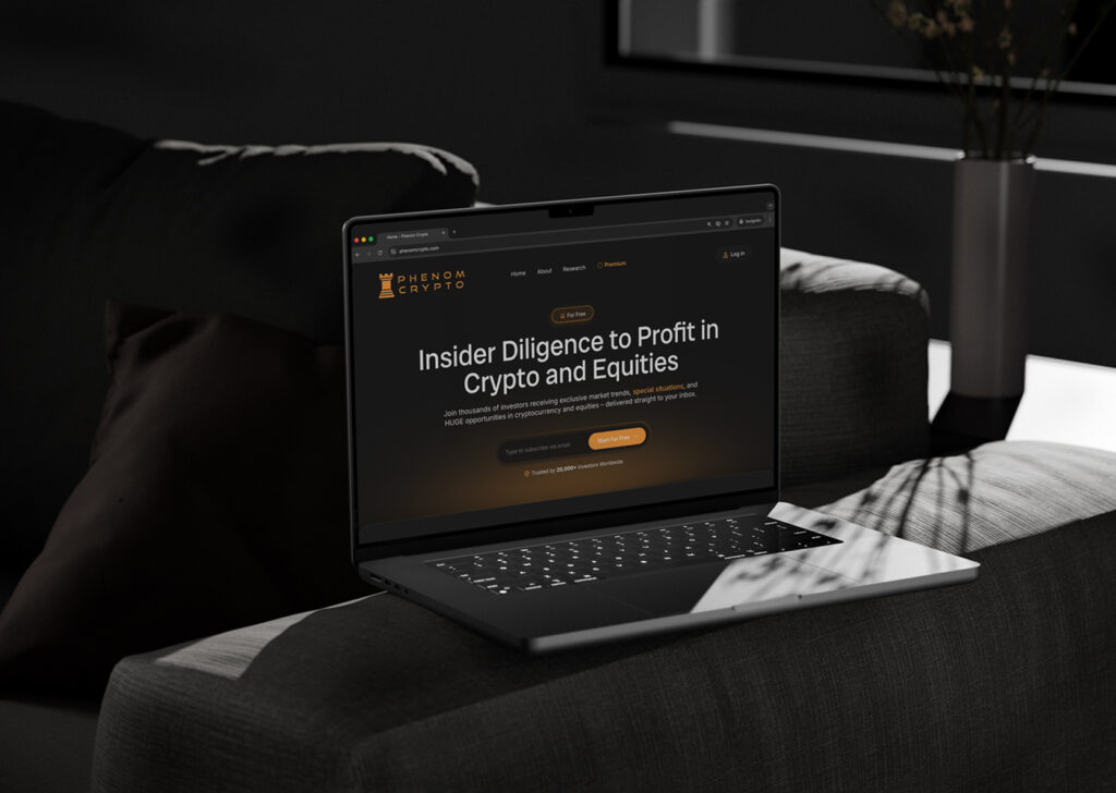 Phenom Crypto website redesign hero section displayed on a laptop mockup.