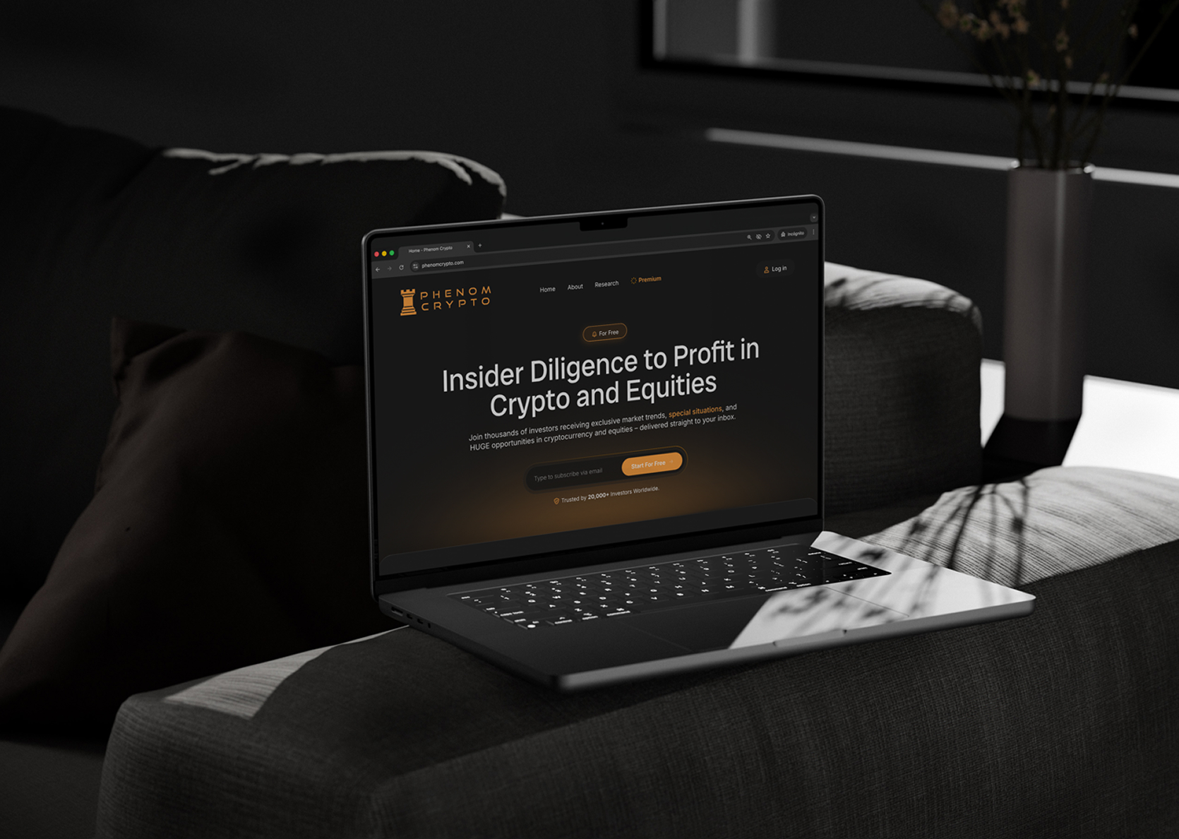 Phenom Crypto website redesign hero section displayed on a laptop mockup.